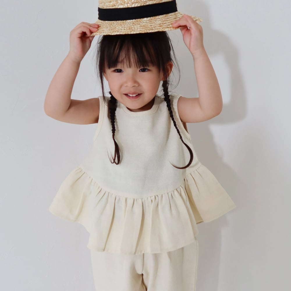 ペプラムブラウス