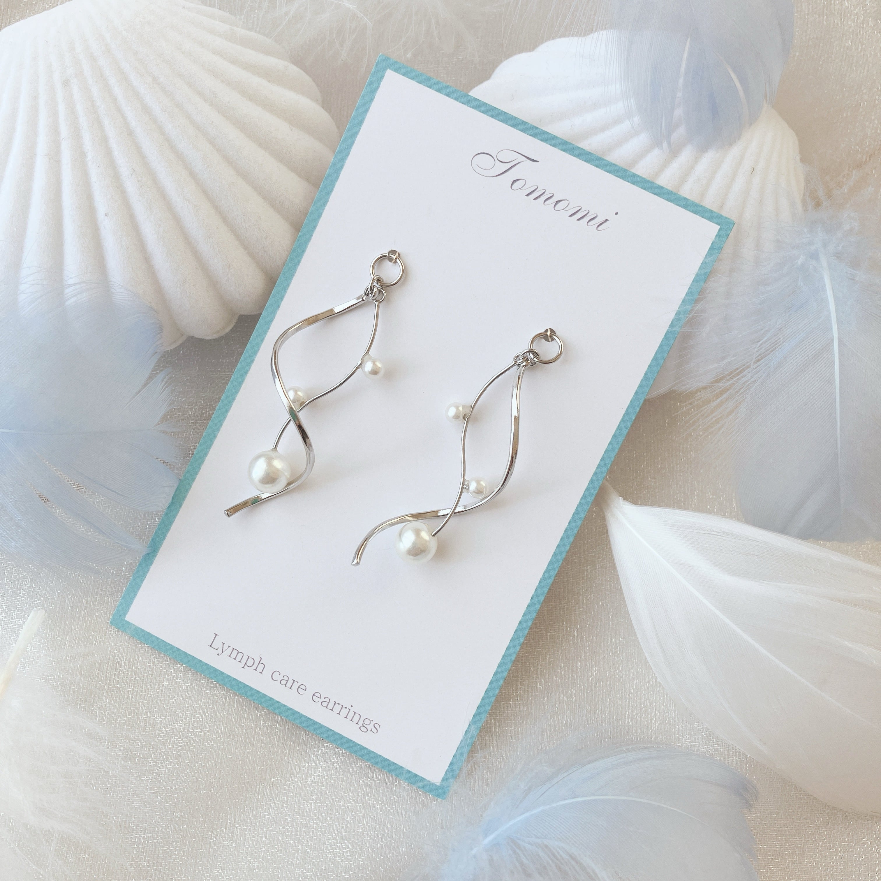 キャッツアイのリボンチャームと蝶々のパールチャーム♪マスクチャーム