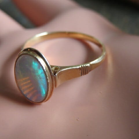 ヴィンテージ K18 光彩オパール覆輪留めリング