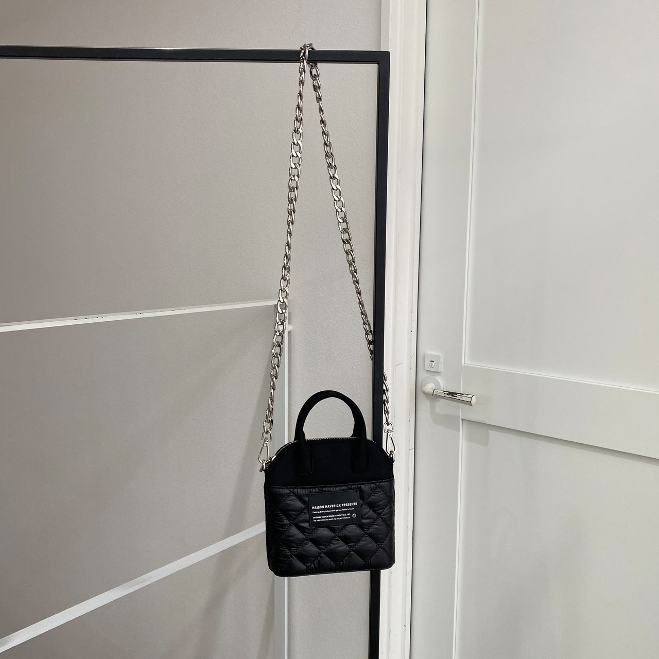 【受注予約：7月中旬入荷予定】quilted mini hand bag/black