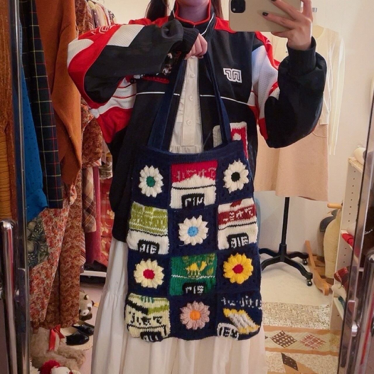 original / cigarette display rack knit tote bag