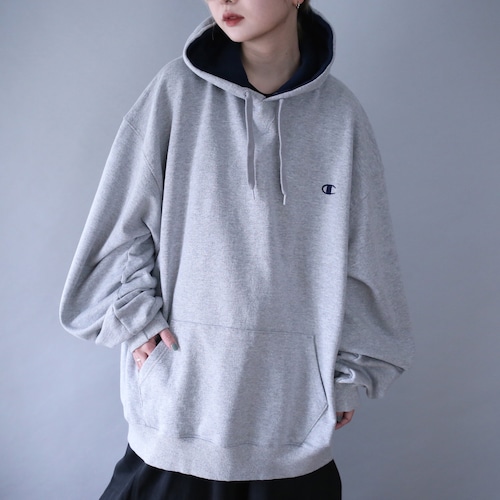 "Champion" light gray color over silhouette sweat parka