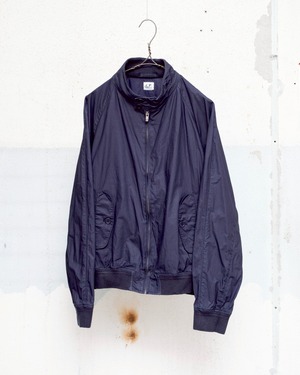 “C.P. Company” polyurethane–coated cotton drizzler jacket / raglan sleeve