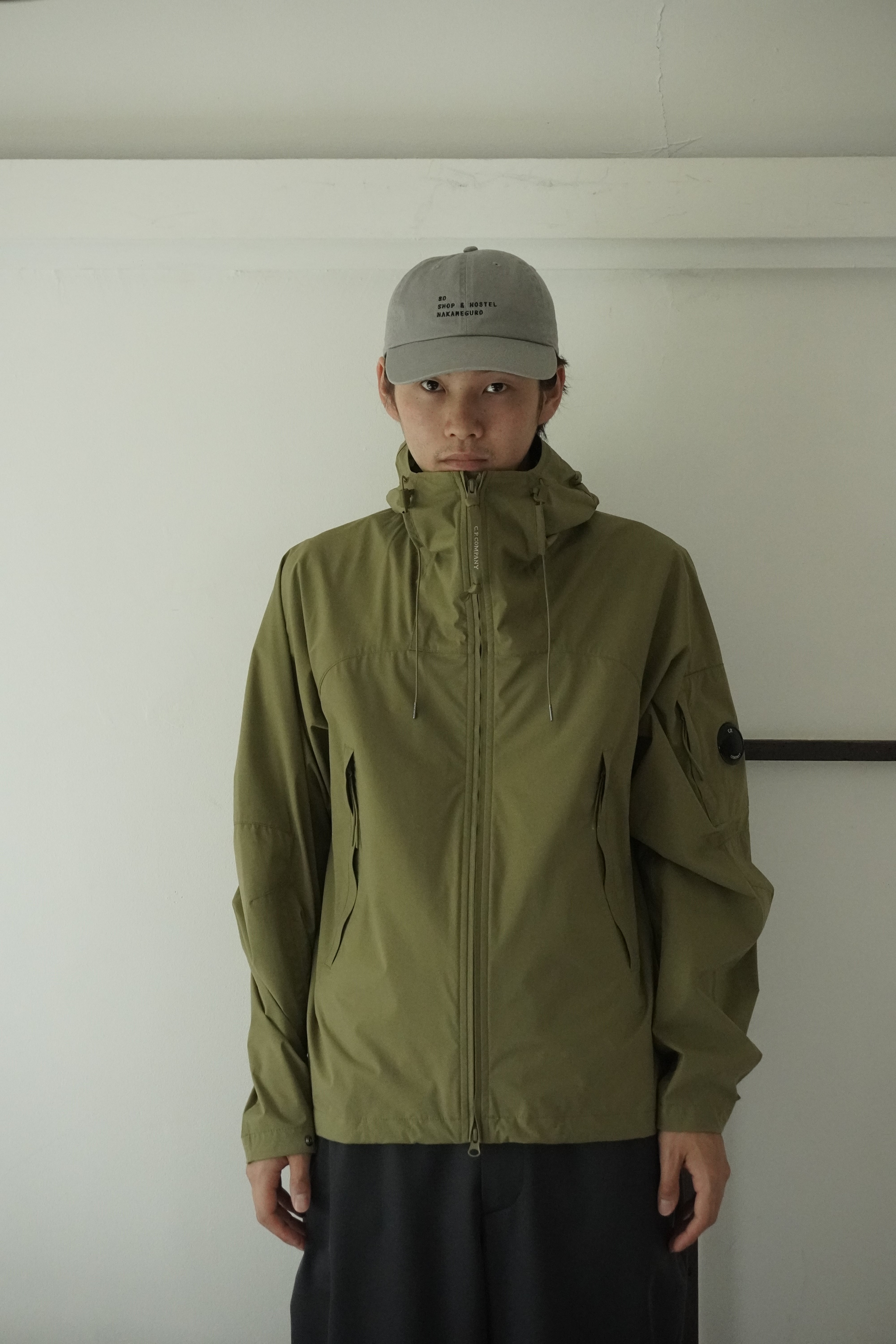 C.P. COMPANY PRO-TEK HOODED LENS JACKET (OLIVE) | SO SHOP & HOSTEL