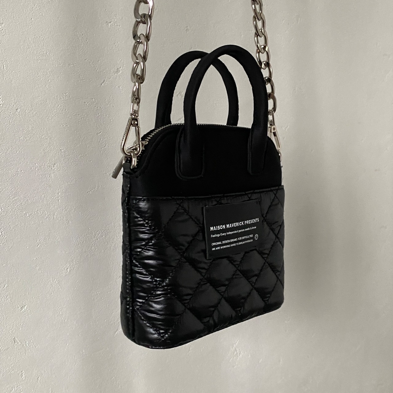 【受注予約：7月中旬入荷予定】quilted mini hand bag/black