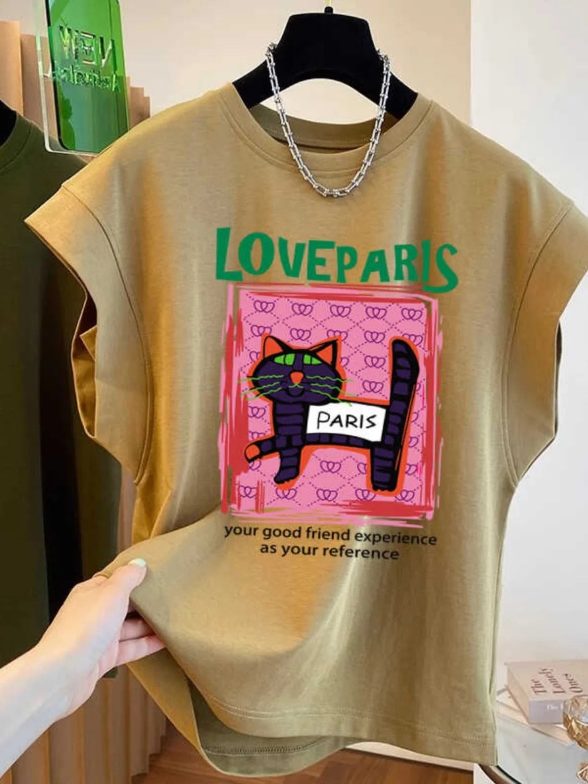 純粋な綿半袖 Tシャツ女性の夏の新しい漫画プリントデザイン肩出しフライングスリーブ通勤スタイル韓国ルーズフィット