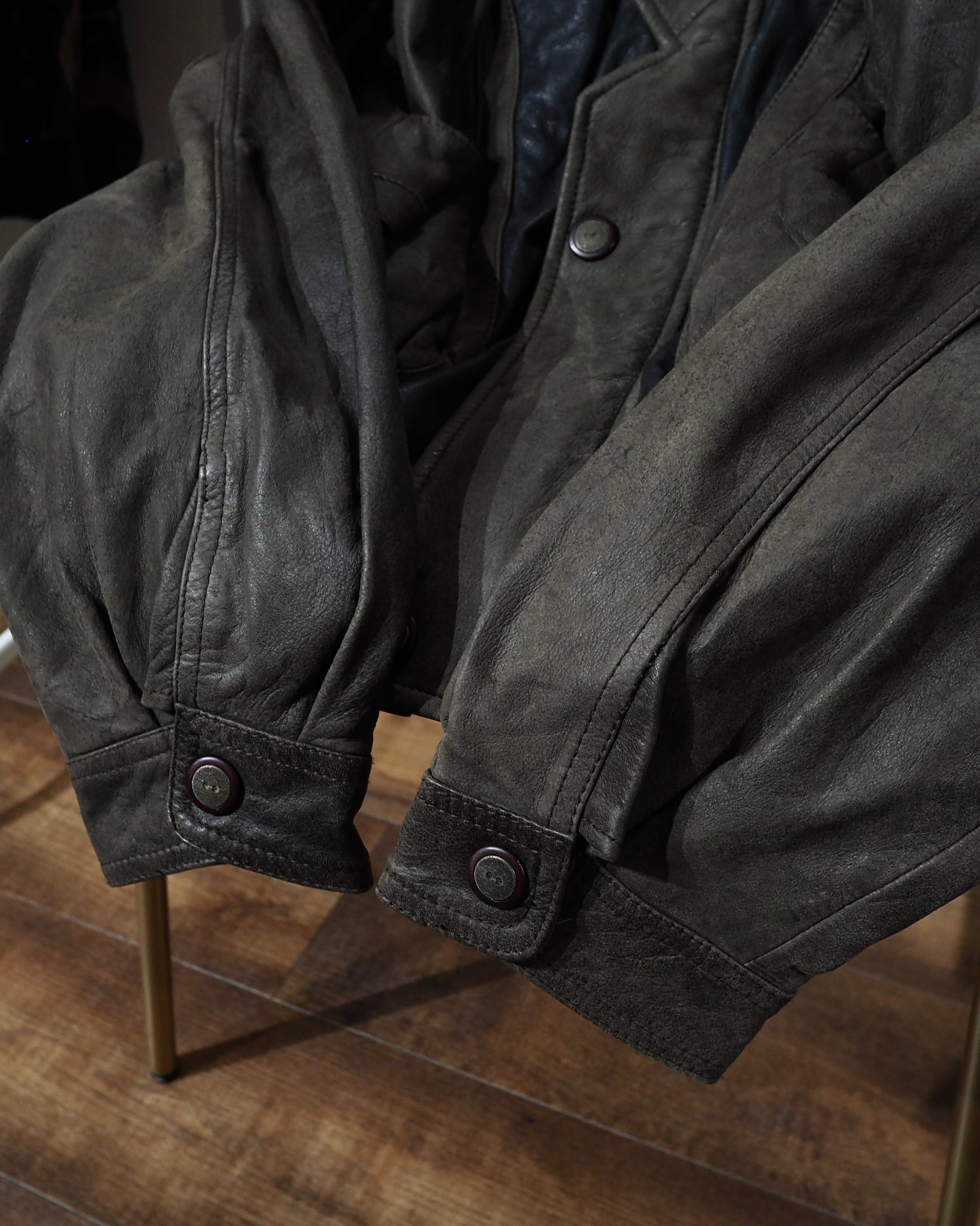 " 変形 × 分離 " Sleeve Detachable Gimmick × Panel Switching Vintage Loose Leather Jacket