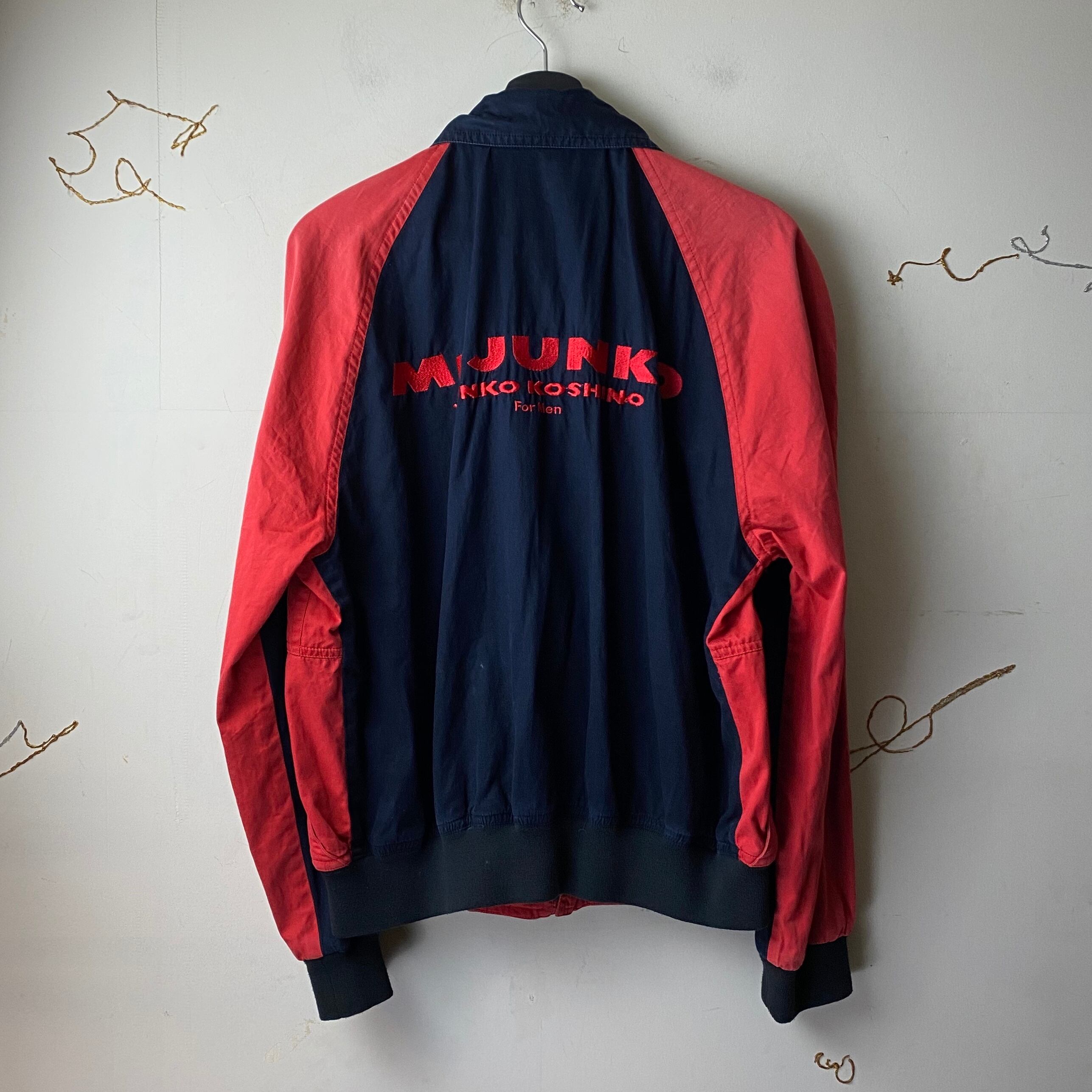 MR.JUNKO back logo embroidery bicolor blouson | NOIR ONLINE