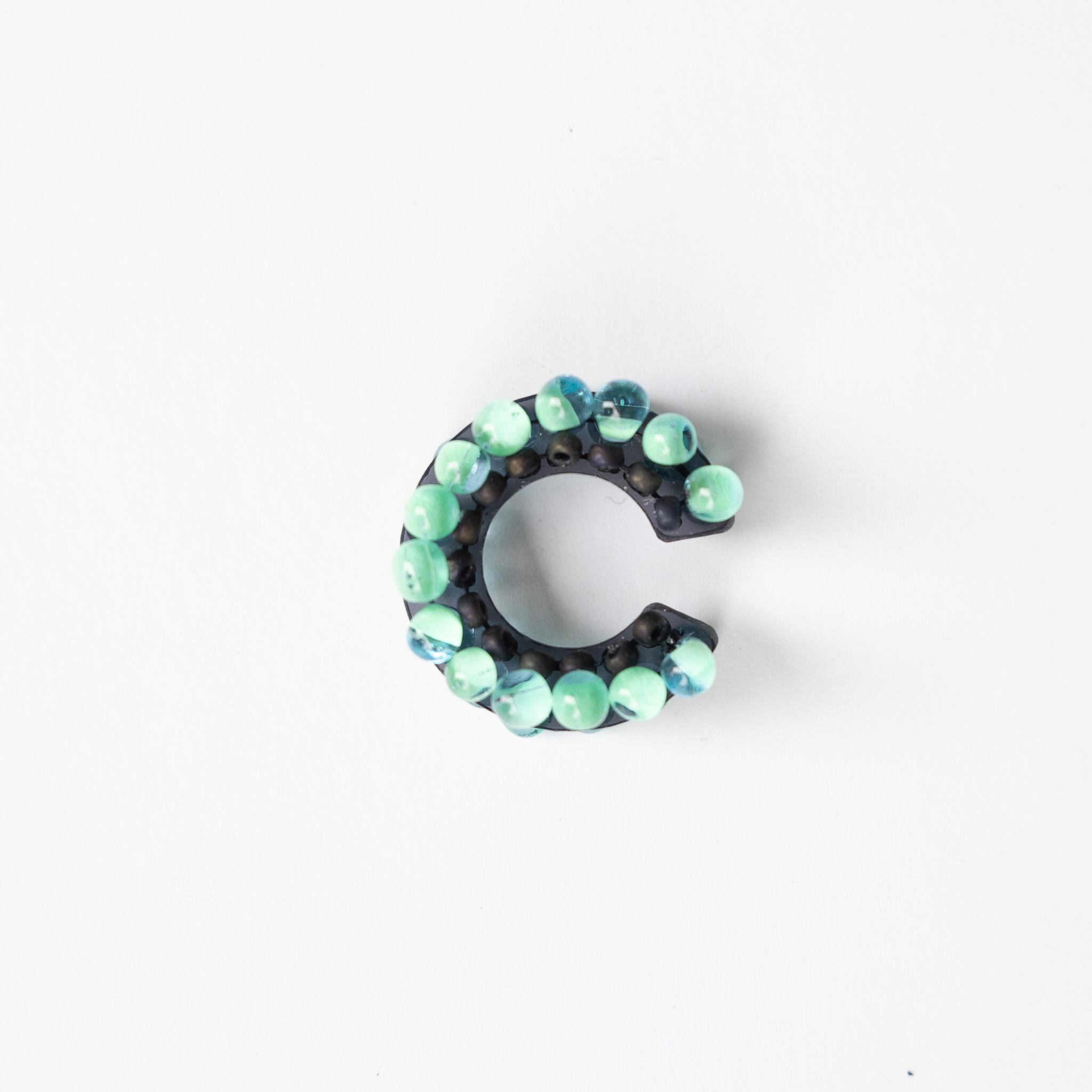 puzzle ring ear cuff [23]