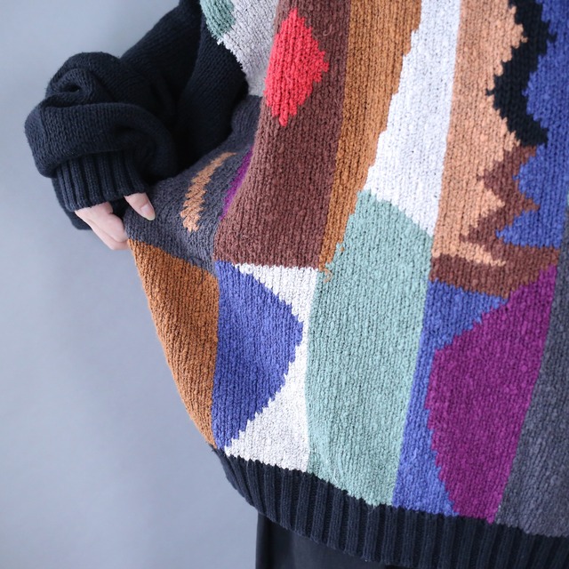 black base colorful art pattern over silhouette knit