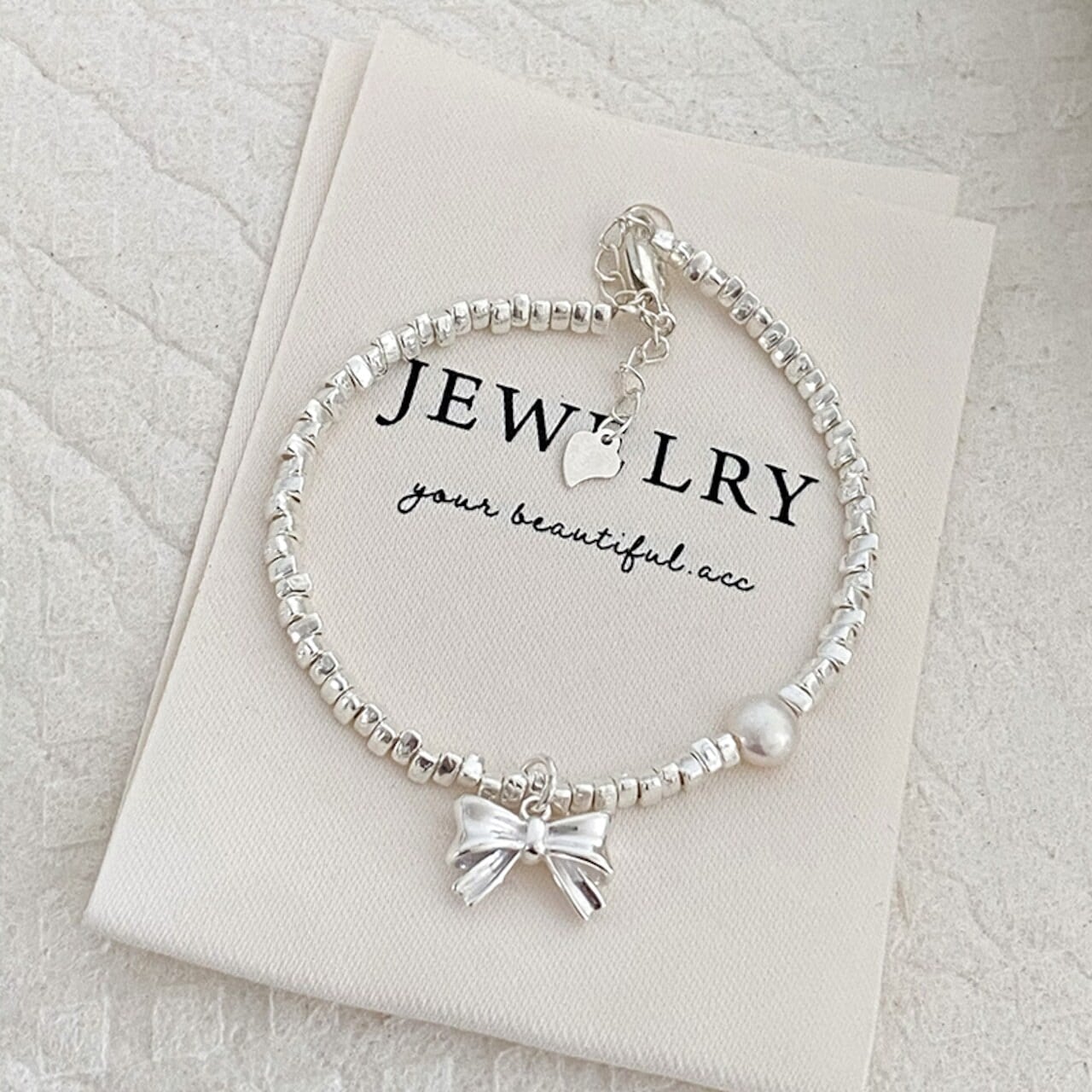 lucksilverシルバーリボンのブレスレット