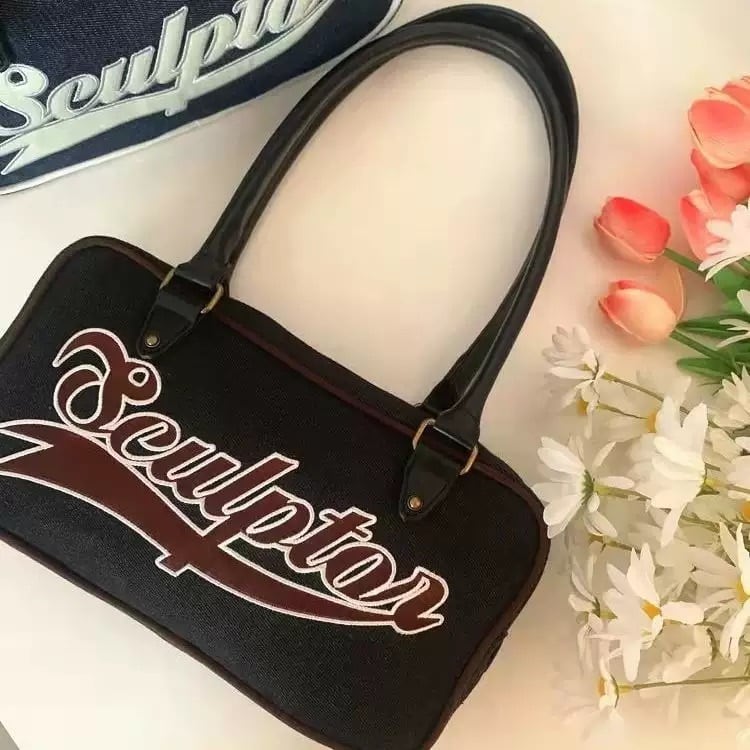 持ちやすさバッチリ ♪ レトロっぽ スポーティーな ボストンバッグ