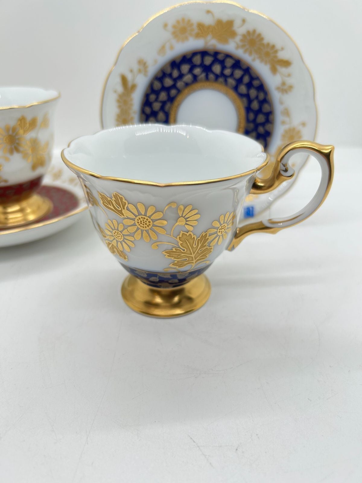 大倉陶園】 金白金蝕吉祥菊白樺文 瑠璃マロン碗皿揃 | 若林陶器