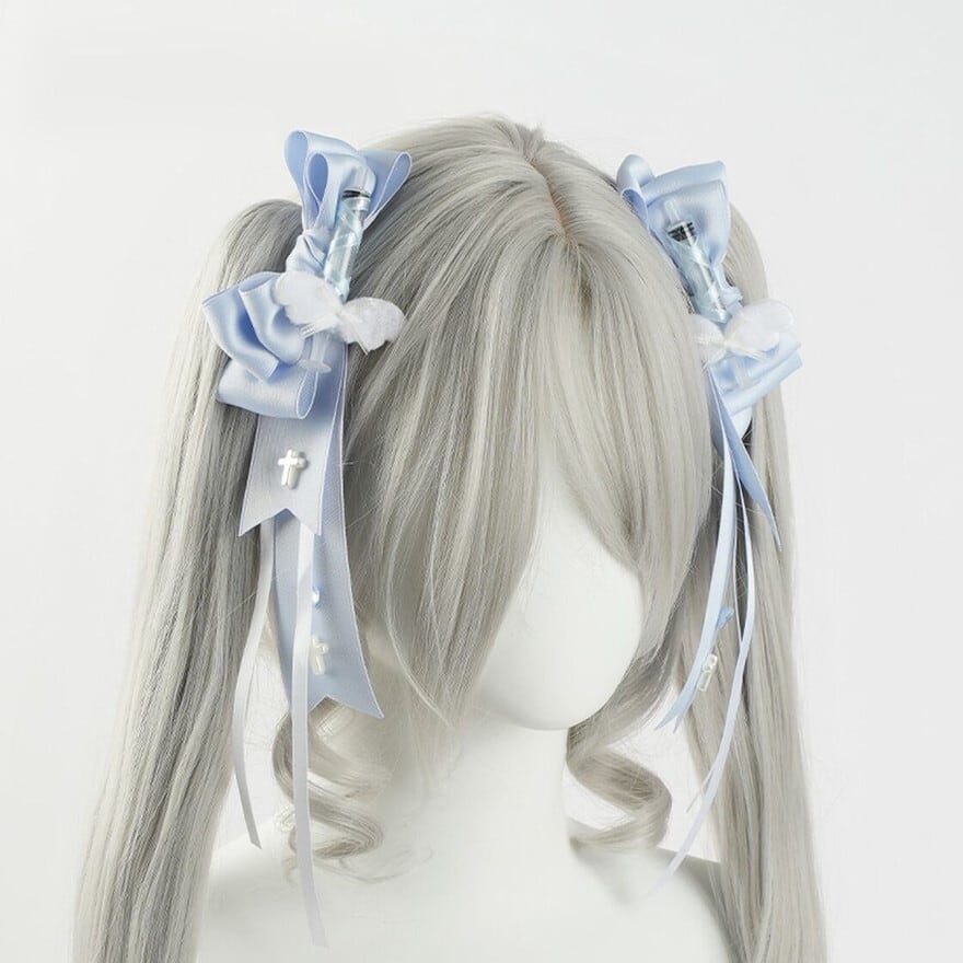 天使界隈を彩る透明感|注射器と十字架が映える、あざとかわいいリボン