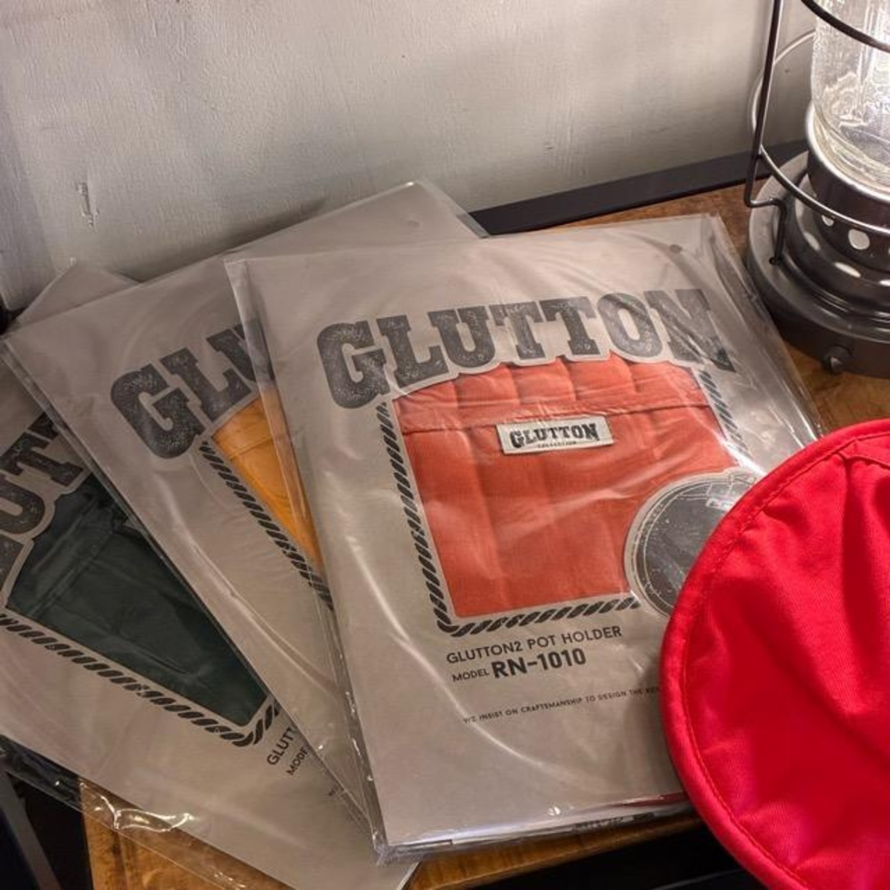 DULTON GLUTTON2 POT HOLDER 3 colors available: Orange, Yellow, and Green. Trivet and pot holder. Ships via mail.