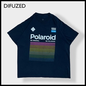 【DIFUZED】2X ビッグサイズ 企業系 ポラロイド Polaroid プリント ロゴ Tシャツ カラフル 半袖 黒 US古着