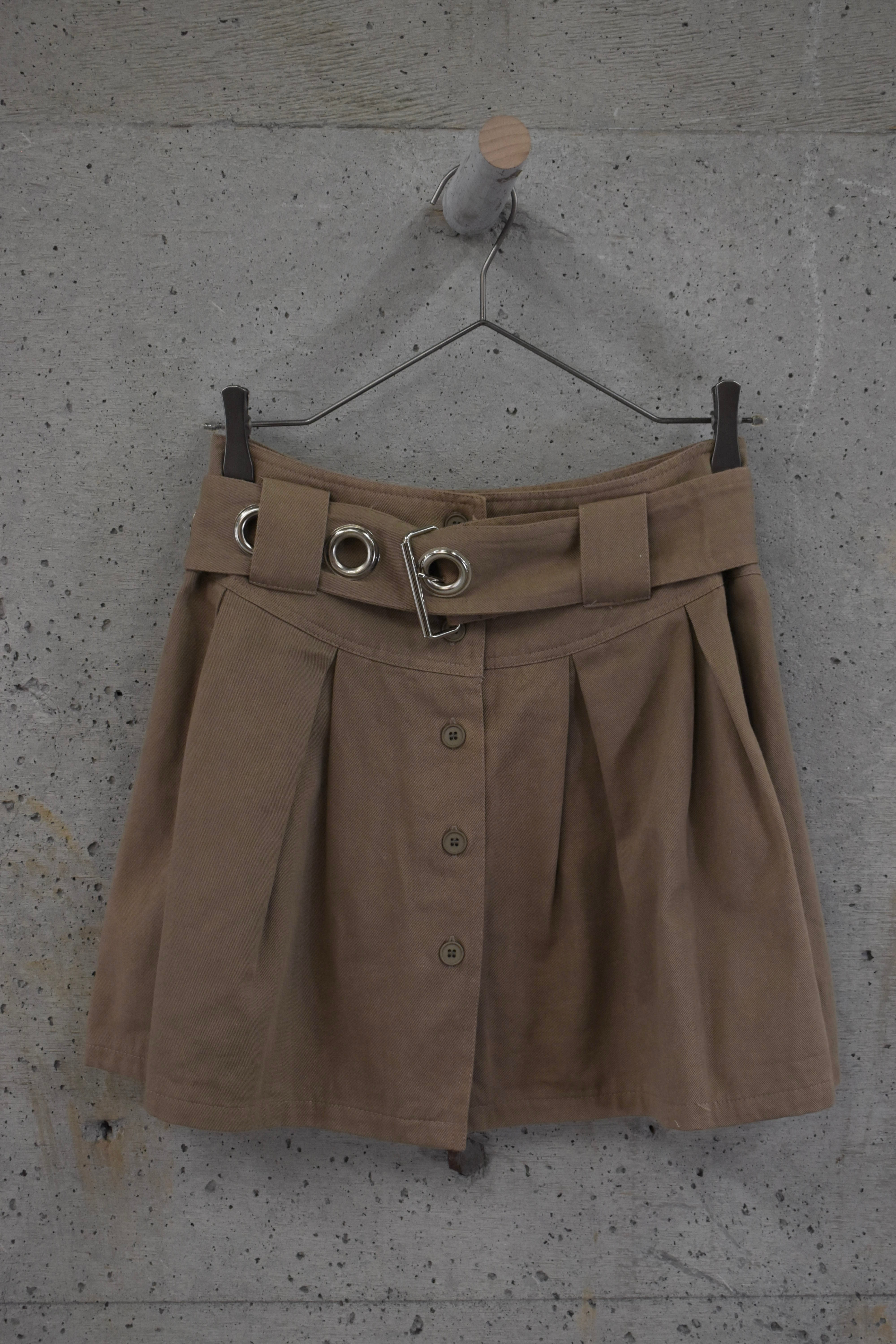 Khaki mini skirt with large eyelets