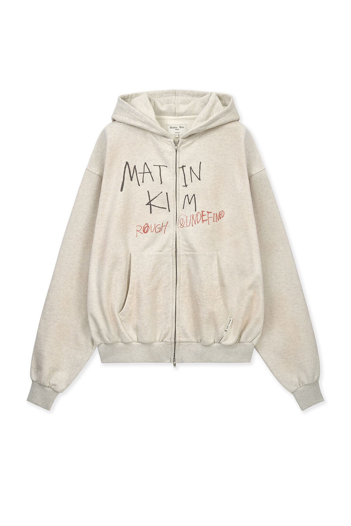 た*こ様 【新品タグ付き】Matin Kim クリーム色 ジップパーカー 4/24発送 [Matin Kim] VINTAGE WASHED GRAFFITI HOODY ZIP UP IN BEIGE