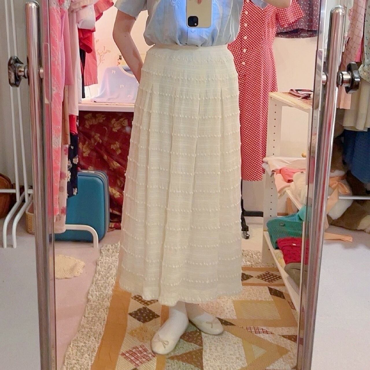 NINARICCI / mini ponpon white flare skirt