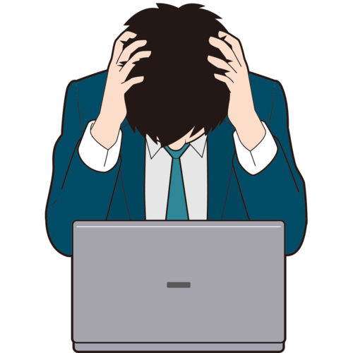 パソコンの前で頭を抱える男性ビジネスマン