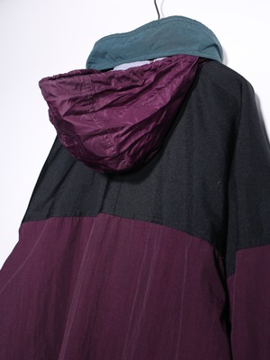 "Colombia" poison coloring over silhouette mountain jacket