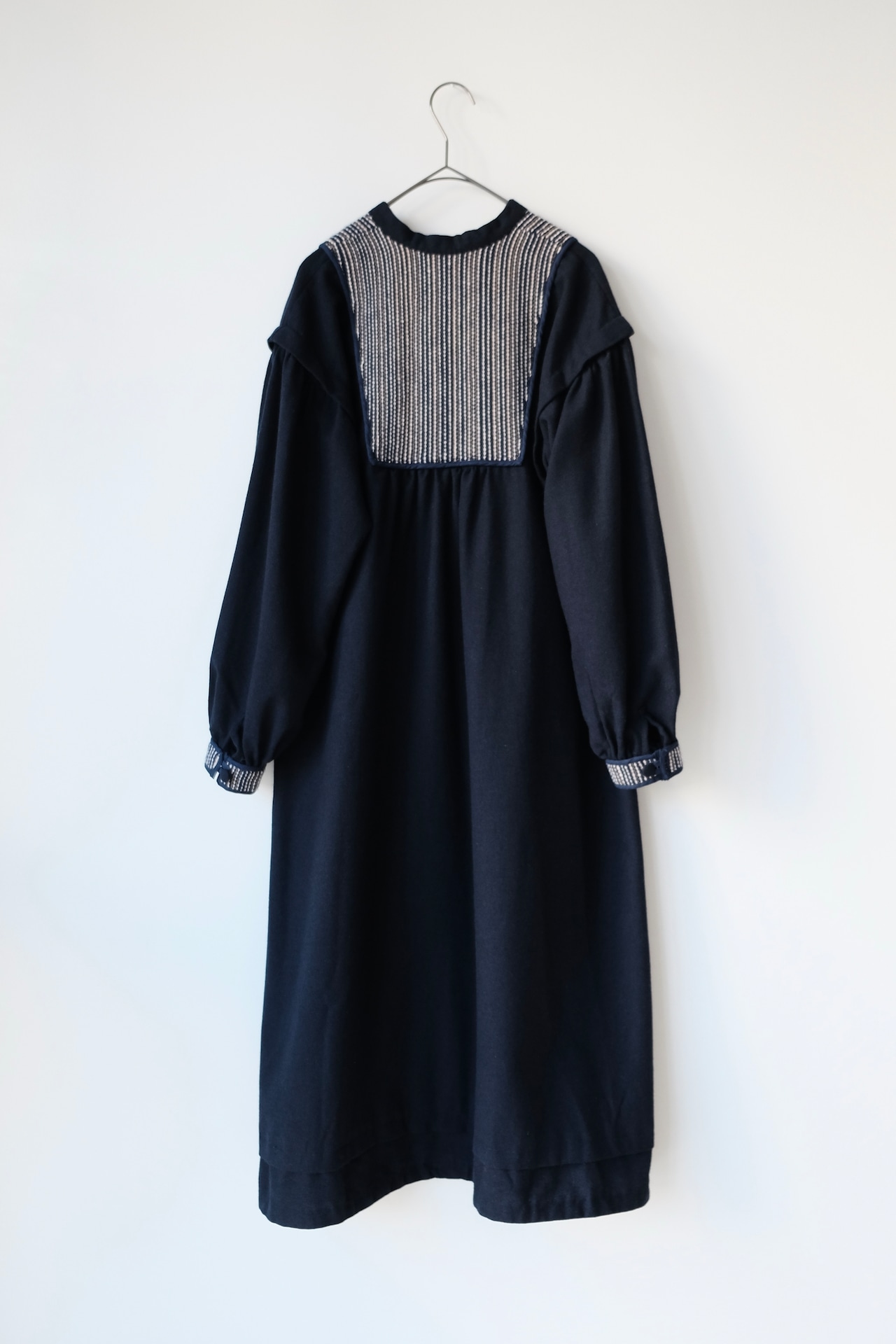 Navy wool dress with woven yoke