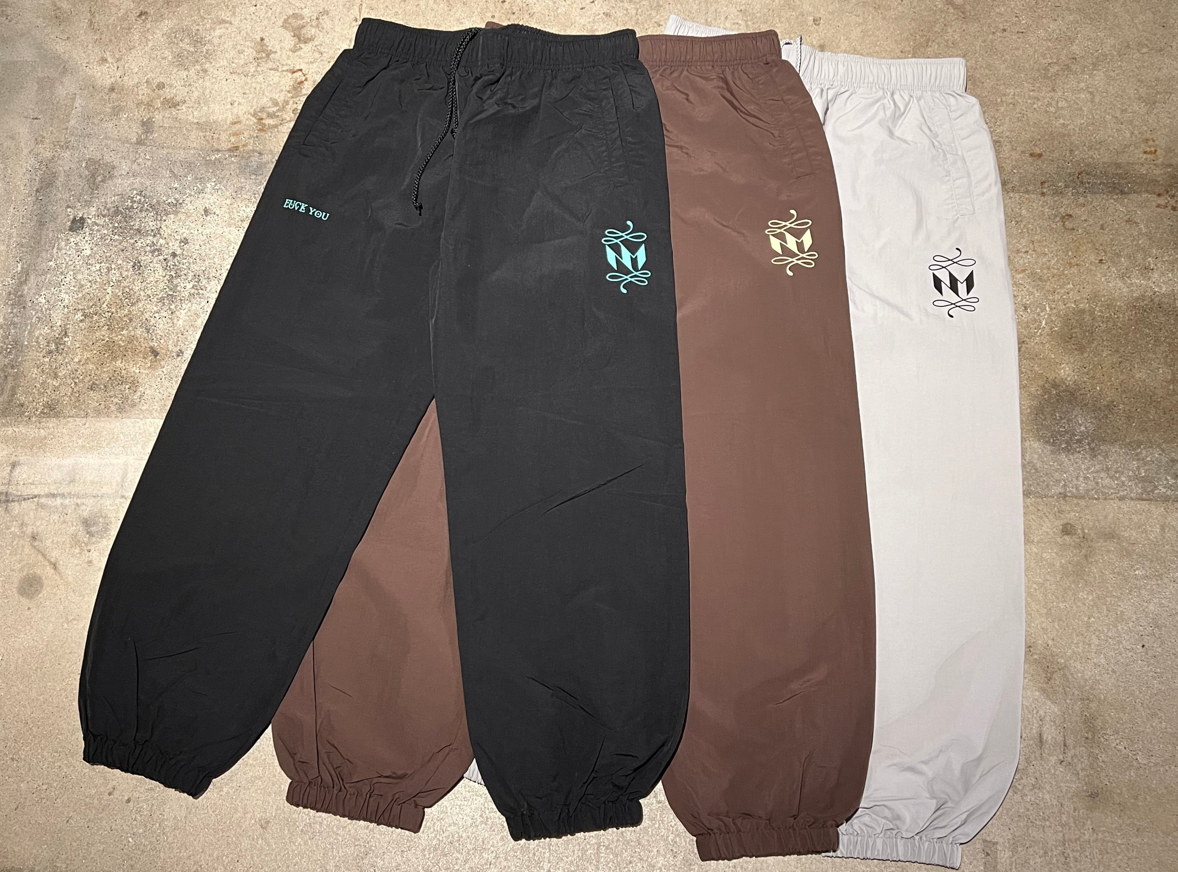 NM PINSTRIPE LOGO NYLON PANTS