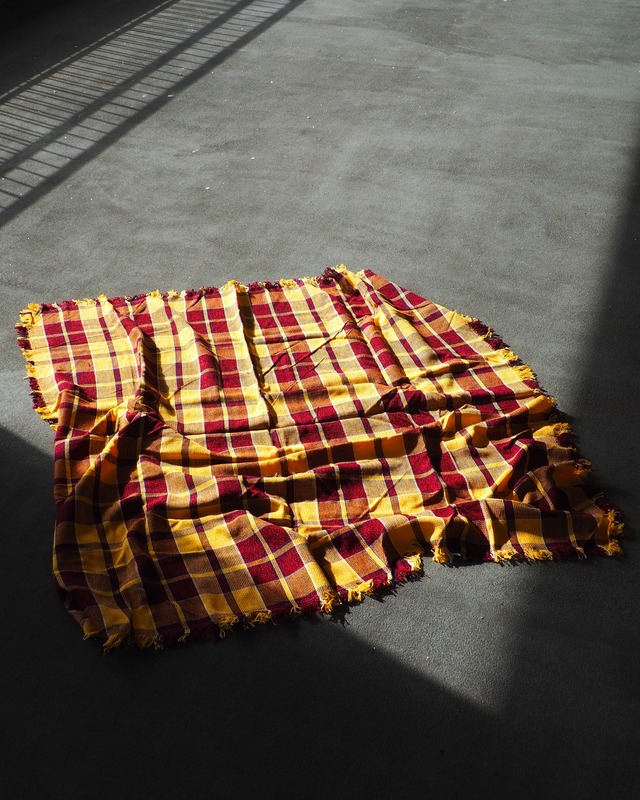 yellow, blue, and dark red plaid big blanket
