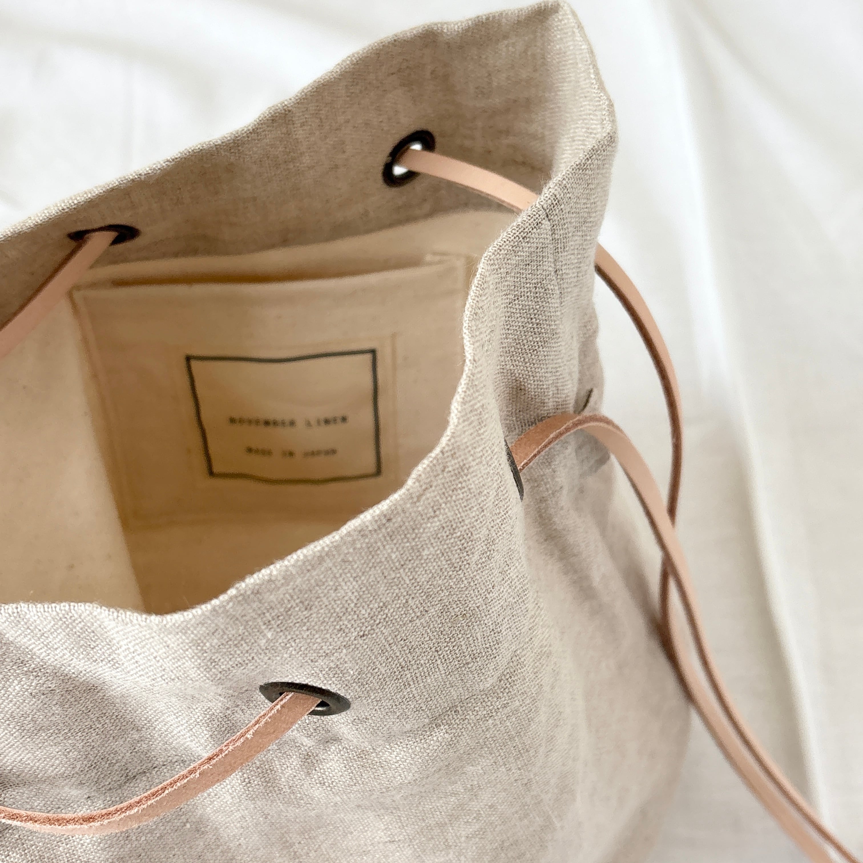 NOVEMBER LINEN リネン丸底巾着バッグ | drôletyque