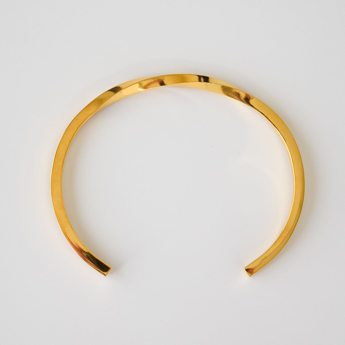 ステンレスナローツイストバングルゴールド | Dimia -ディミア- 公式