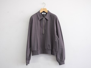 REVERBERATE” HALF ZIP JERSEY”