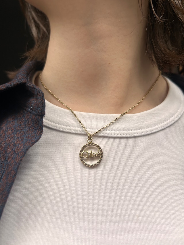 Chloe  / vintage circle logo stone necklace.