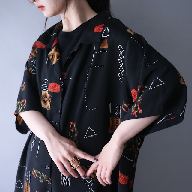 geometry art graphic pattern XXX over silhouette open collar h/s shirt