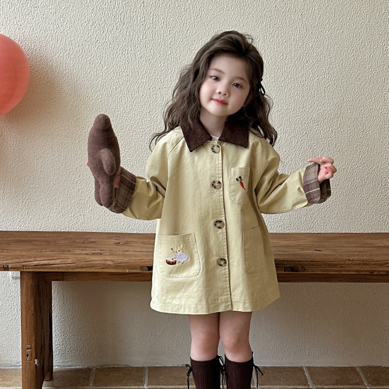 秋ニンジン柄トレンチコート