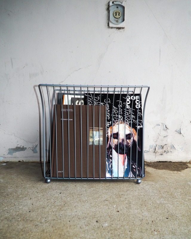 Grey wire magazine rack