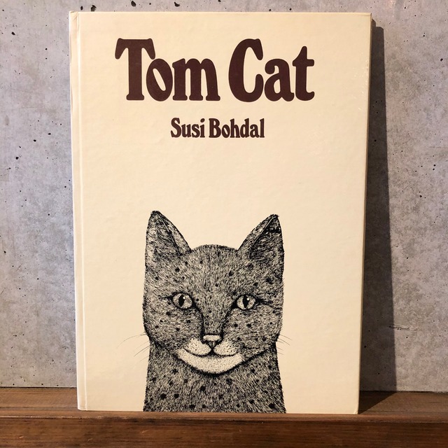 TOM CAT