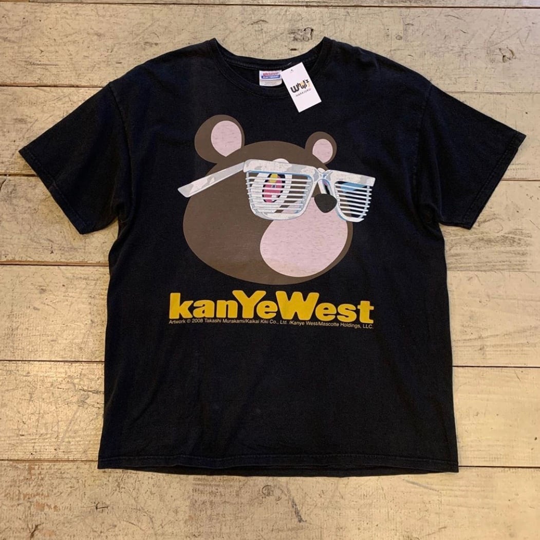 2008s KANYE WEST T-shirt design by Takashi Murakami | What’z up powered by  BASE