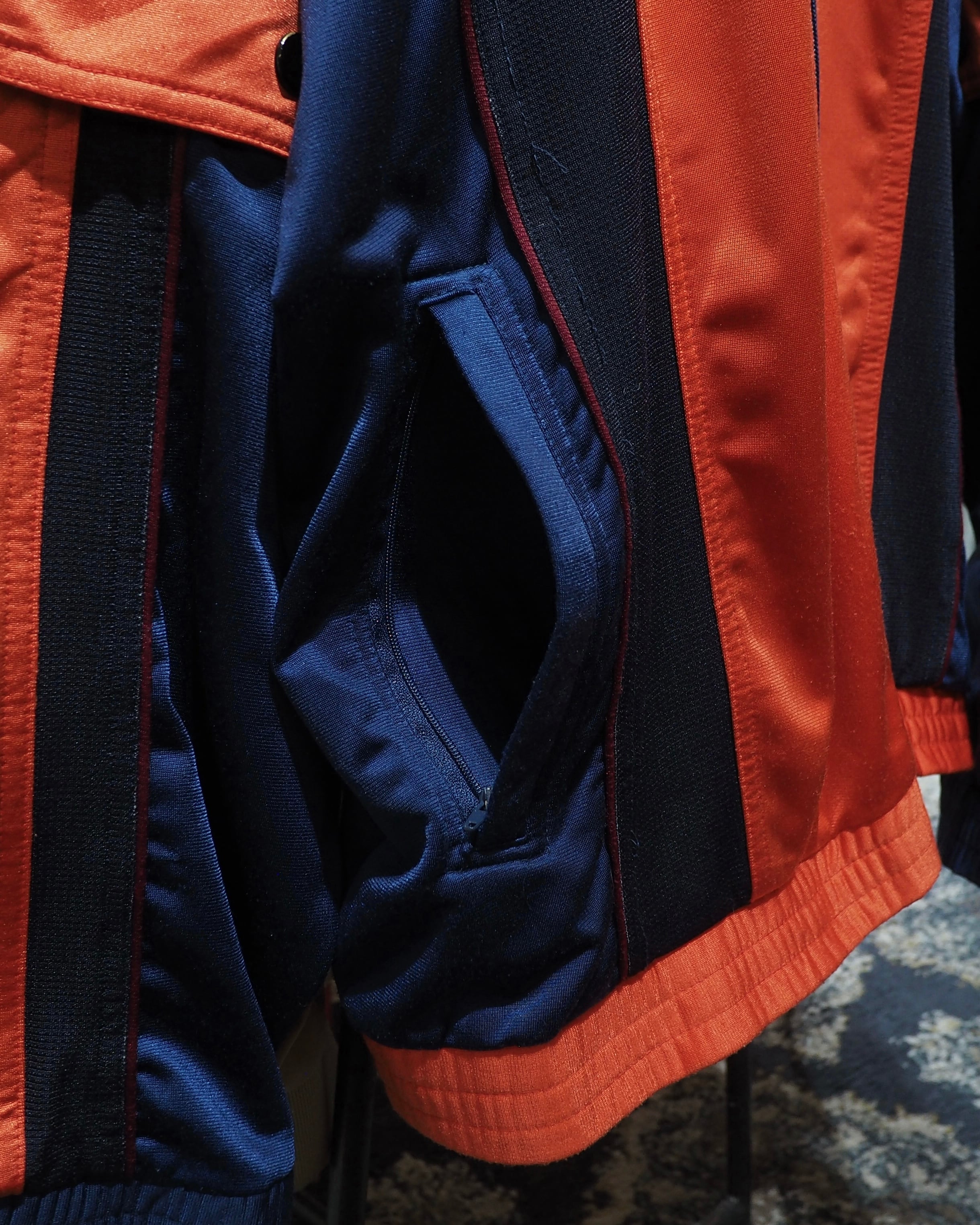1990s " UMBRO " Vivid Orange × Dark Navy Switching Panel Vintage Loose Track Jacket