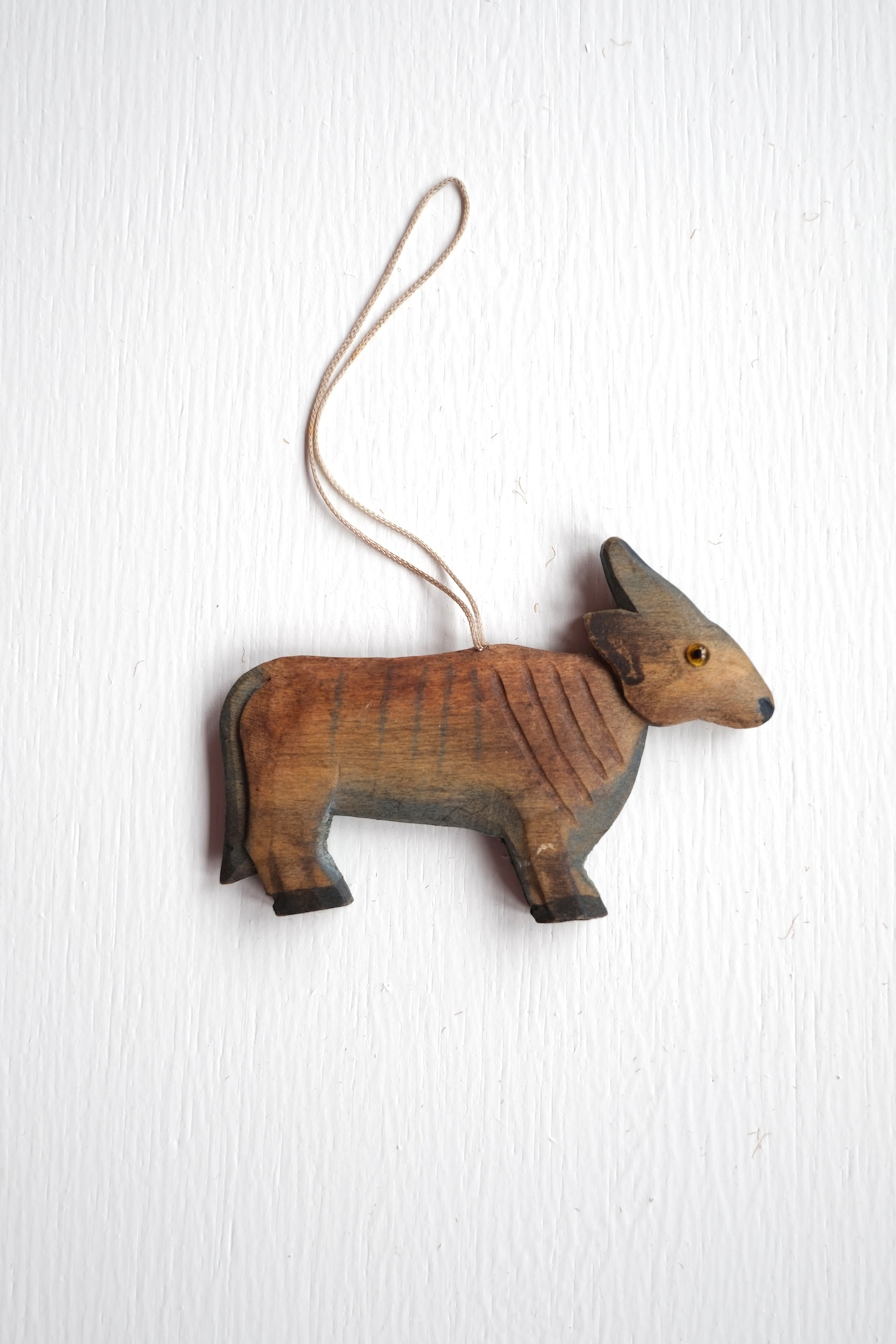 Hand carved moose ornament