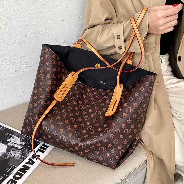 大容量ハンドバッグレディースバッグ2020新しい流行のヨーロッパとアメリカのファッションソフトレザーショルダーバッグネットレッドワイルドポータブルトートバッグ Tiancai_Wing_Bag81863880169