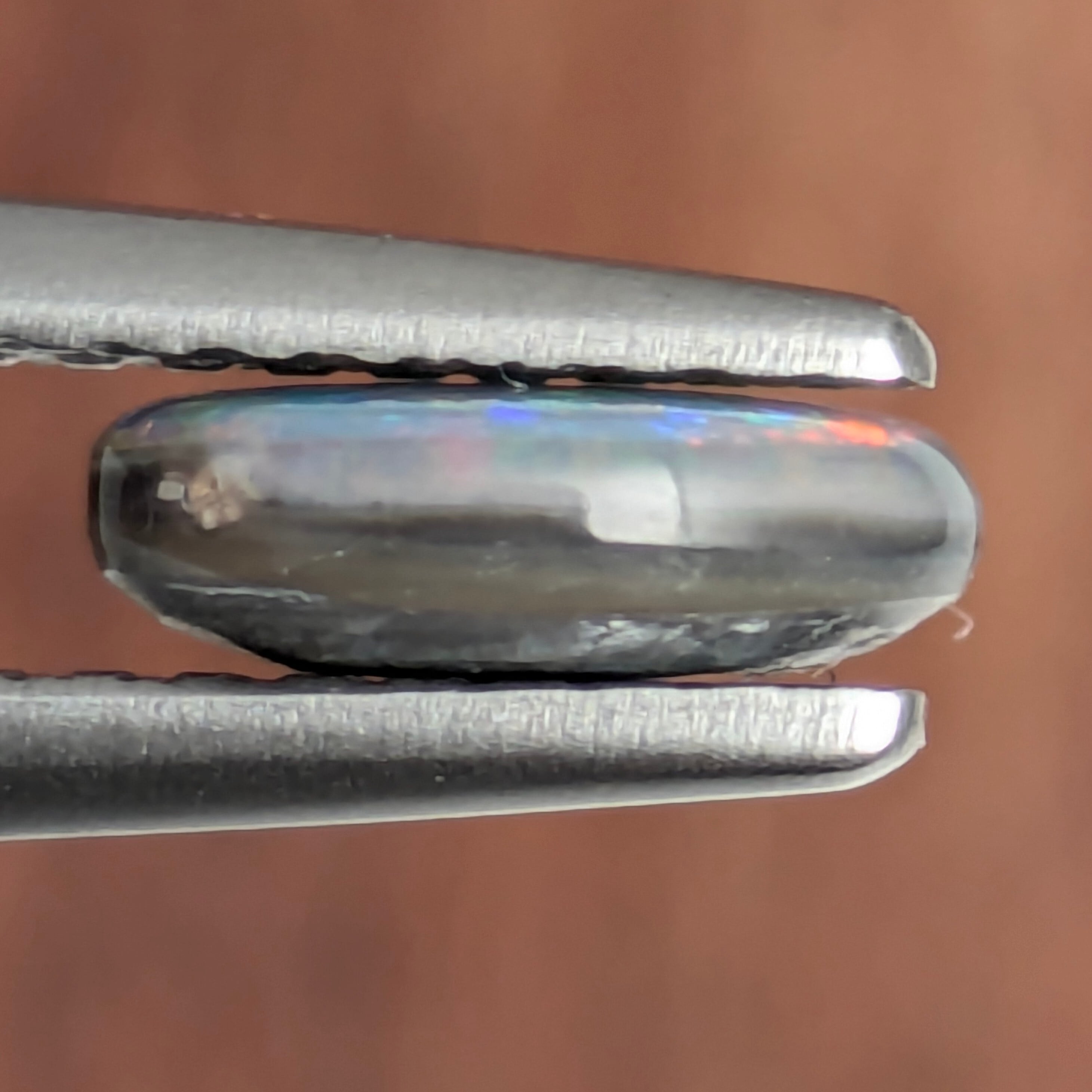 ブラックオパールルース オーストラリア産【0.63ct】 PRO208889