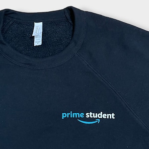 【CANVAS】企業系 企業ロゴ Amazon Prime Student アマゾン ロゴ プリントバックロゴ 袖ロゴ ワンポイント スウェットトレーナー プルオーバー ラグランスリーブ アドバタイジング 黒 M US古着