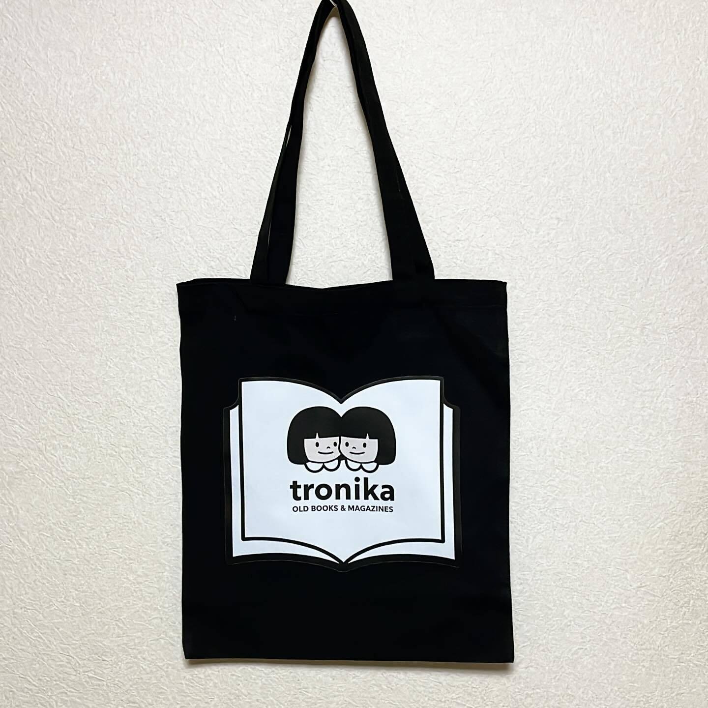 トートバッグ「トロニカ　双子　イラスト　本のロゴマーク　黒」 - 画像1