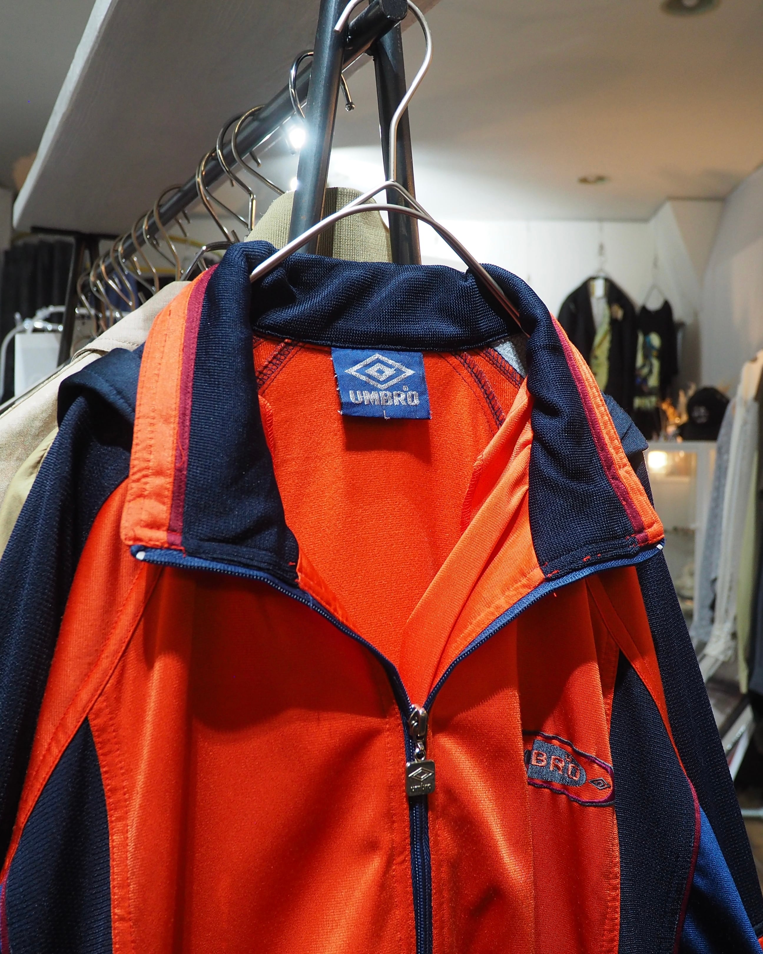 1990s " UMBRO " Vivid Orange × Dark Navy Switching Panel Vintage Loose Track Jacket