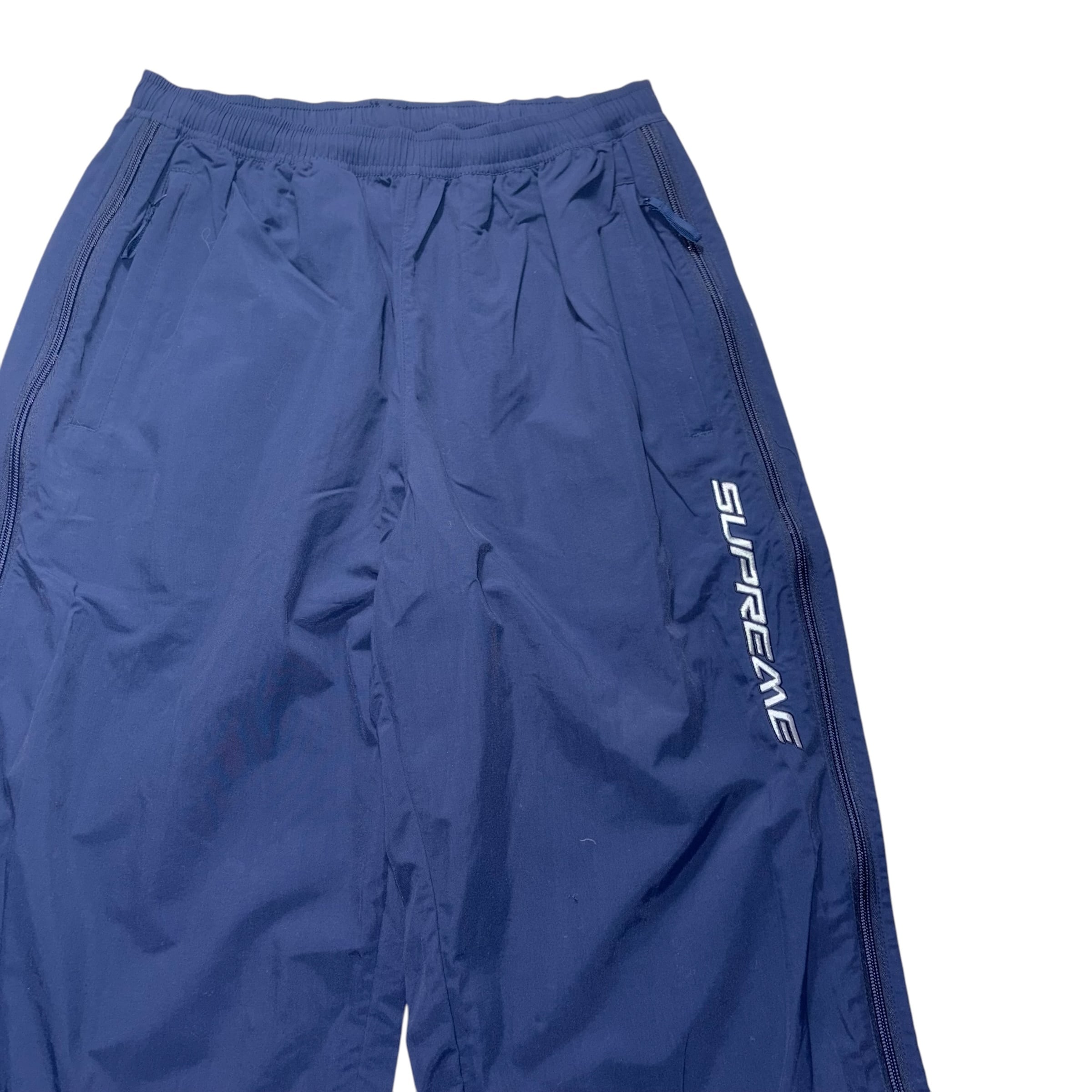 24FW SUPREME warm up pants | NOIR ONLINE