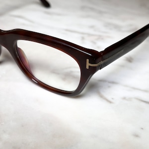 TOM FORD brown color frame glasses with clear lens