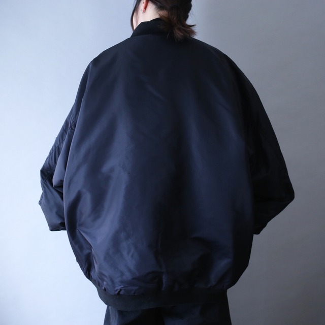 "reversible" black × orange over silhouette type MA-1 bomber jacket