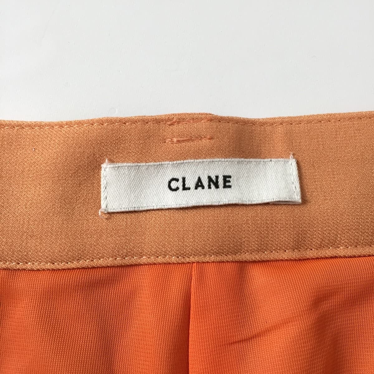 CLANE クラネ ベーシックタックパンツ BASIC TUCK PT ワイドストレート ストレッチ オレンジ |  「フクル」ファッションブランドユーズドセレクトショップ powered by BASE