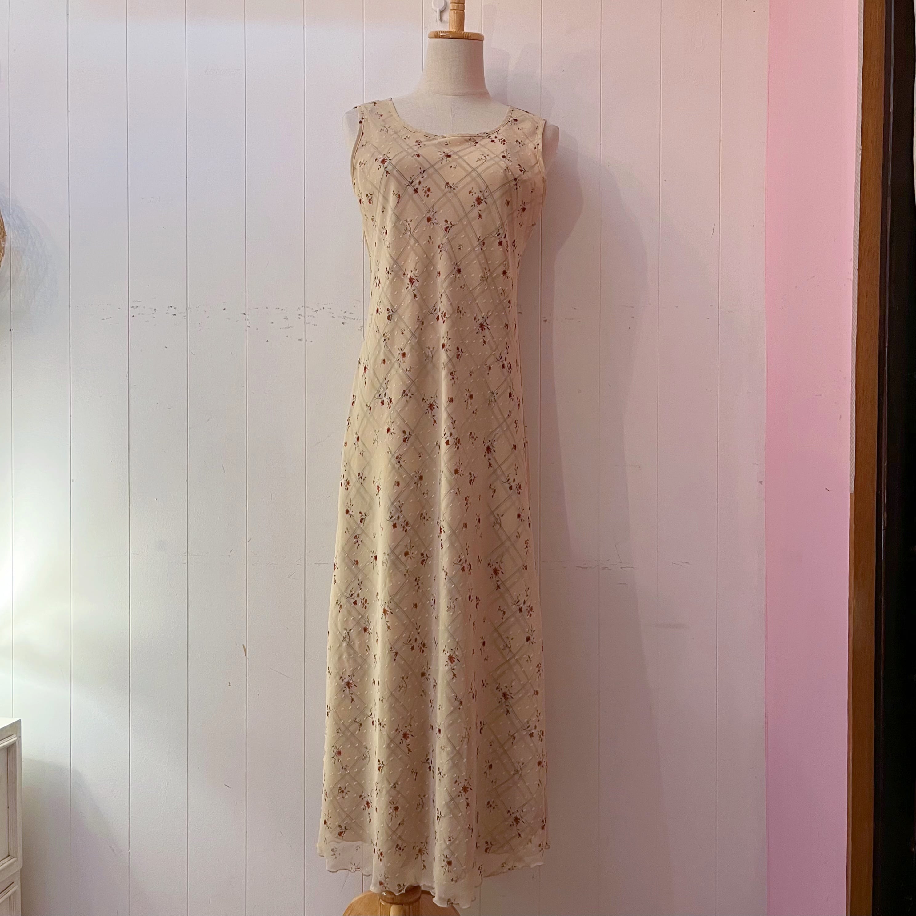 flower check sleeve less one-piece