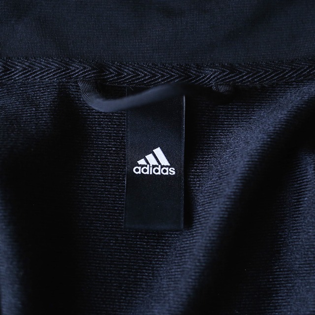"adidas" over silhouette black track jacket